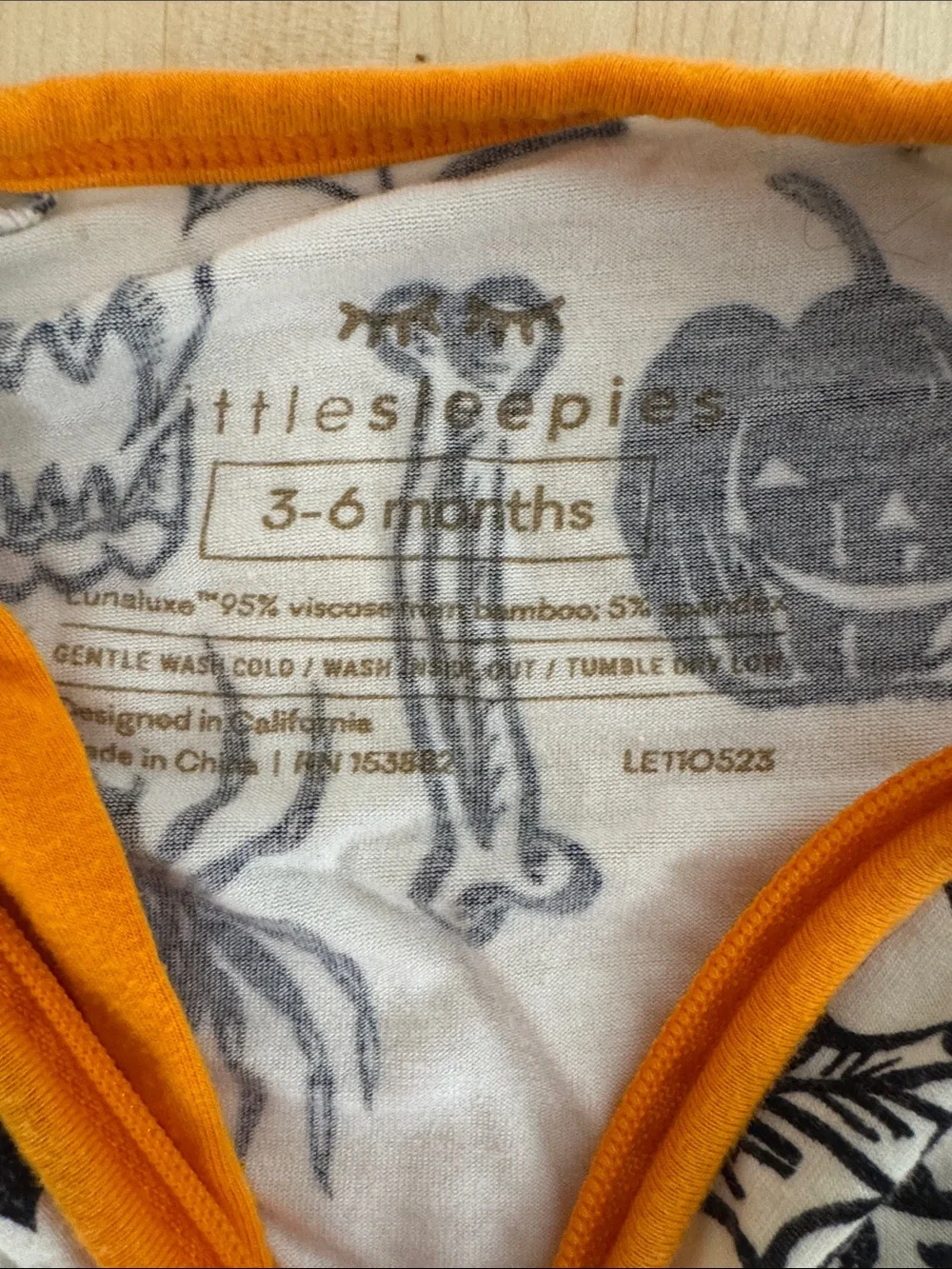 Little Sleepies Black & Orange Halloween Print Footed One-Piece